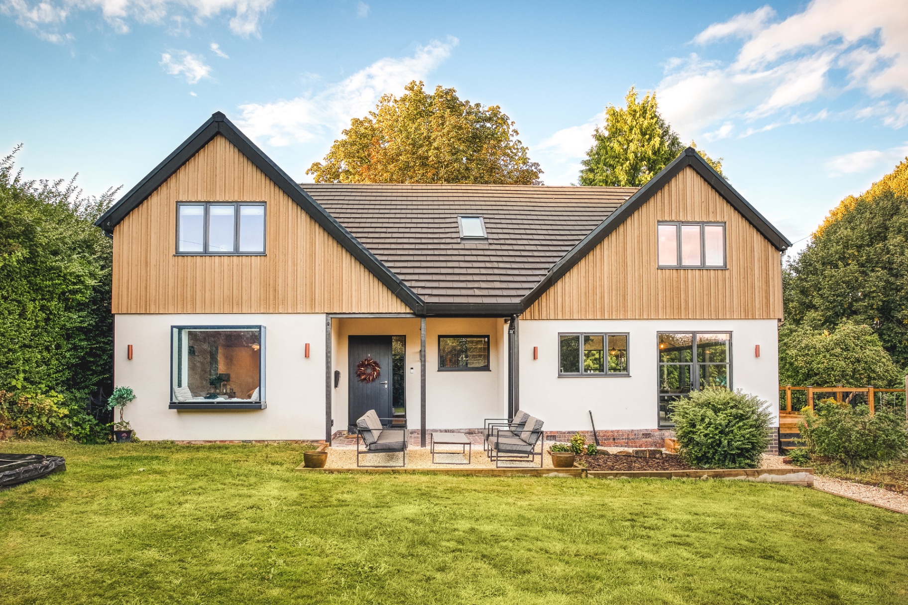 Timber-clad twin-gable new build home designed by Worcester Lloyd in the East Midlands